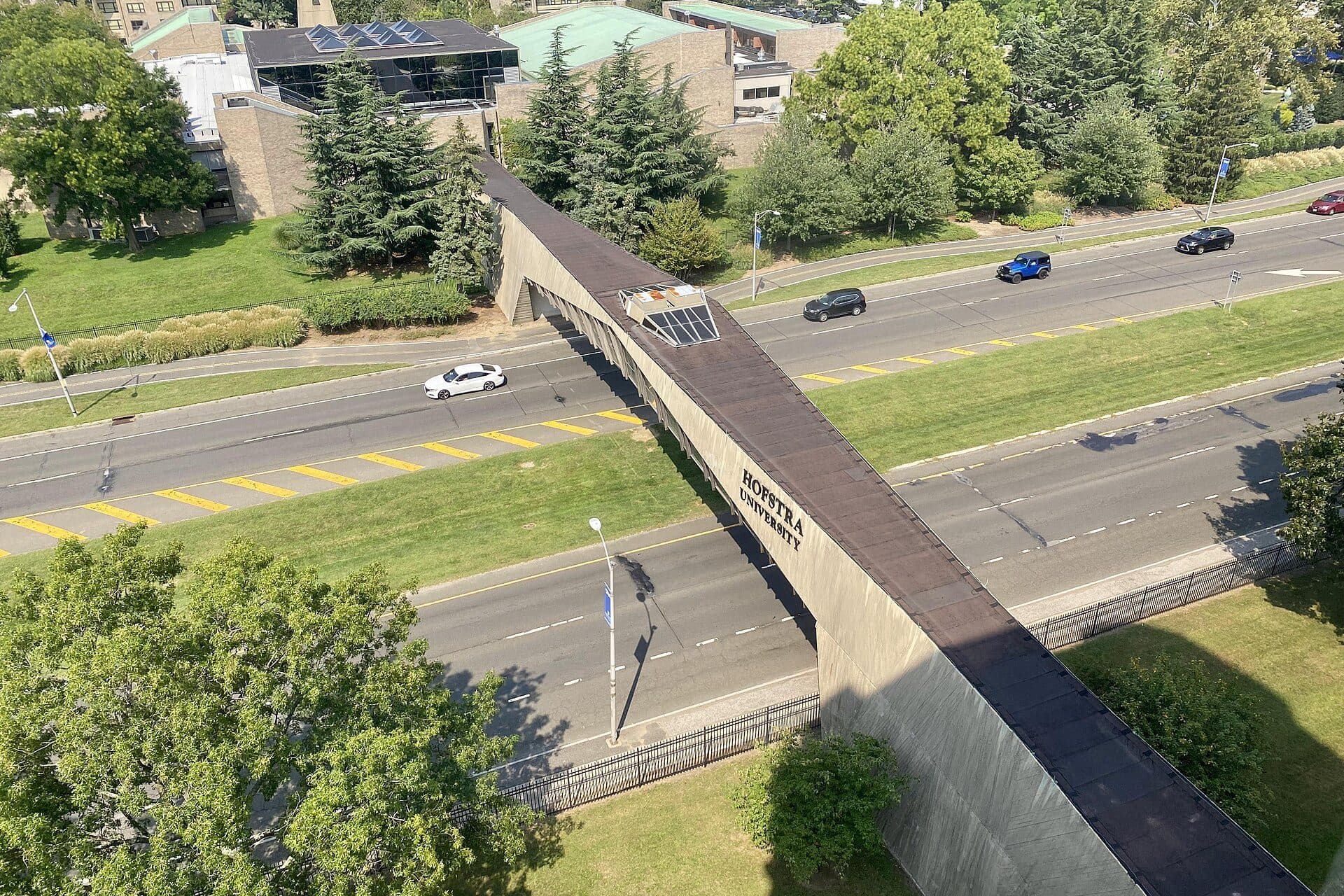 Hofstra's Clifford L. Lord Unispan footbridge crossing Hempstead Turnpike between the north and south campuses, seen from above