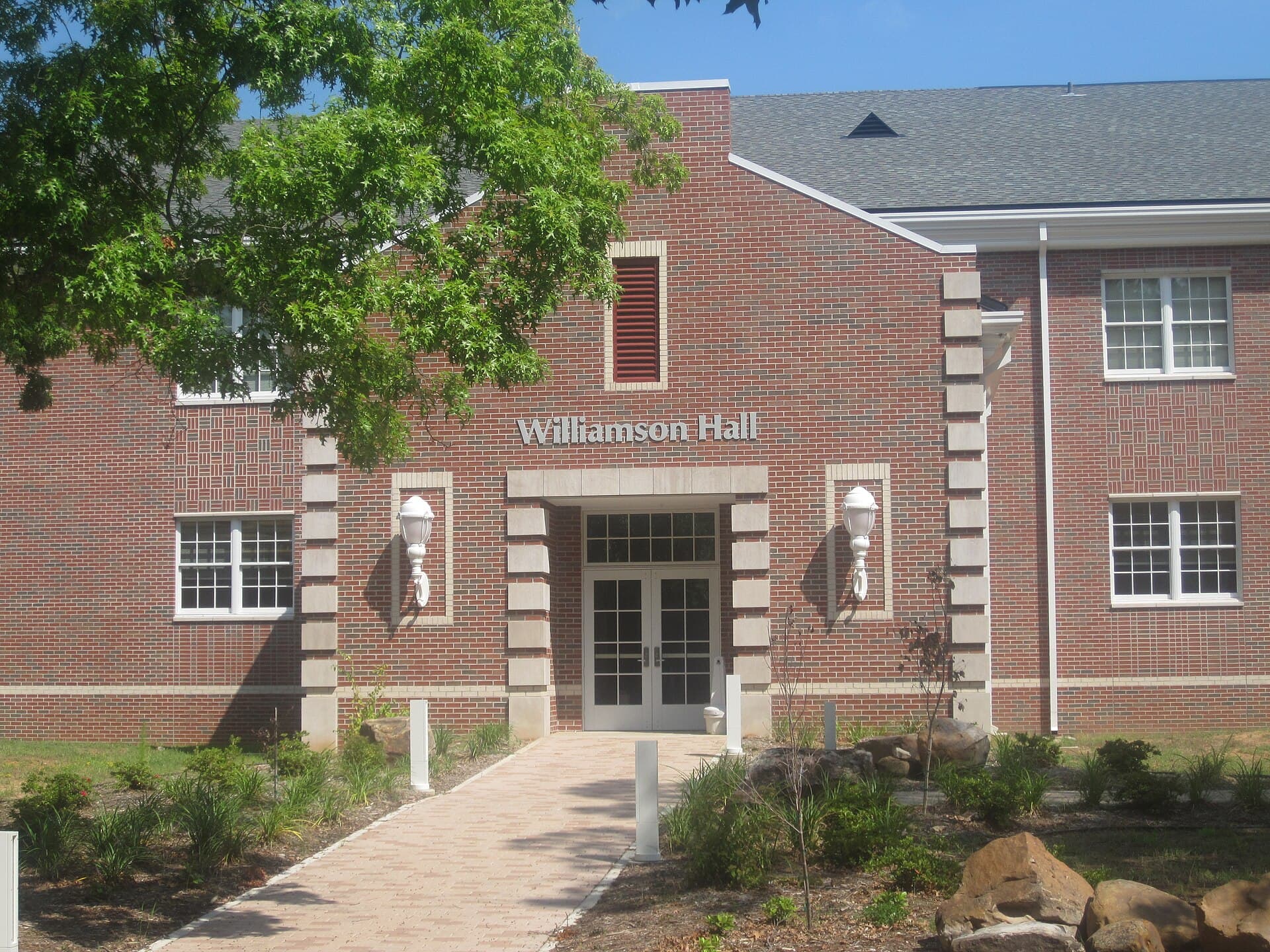 Williamson Hall at Northwestern State University in Natchitoches, a red-brick building with a Williamson Hall sign out front