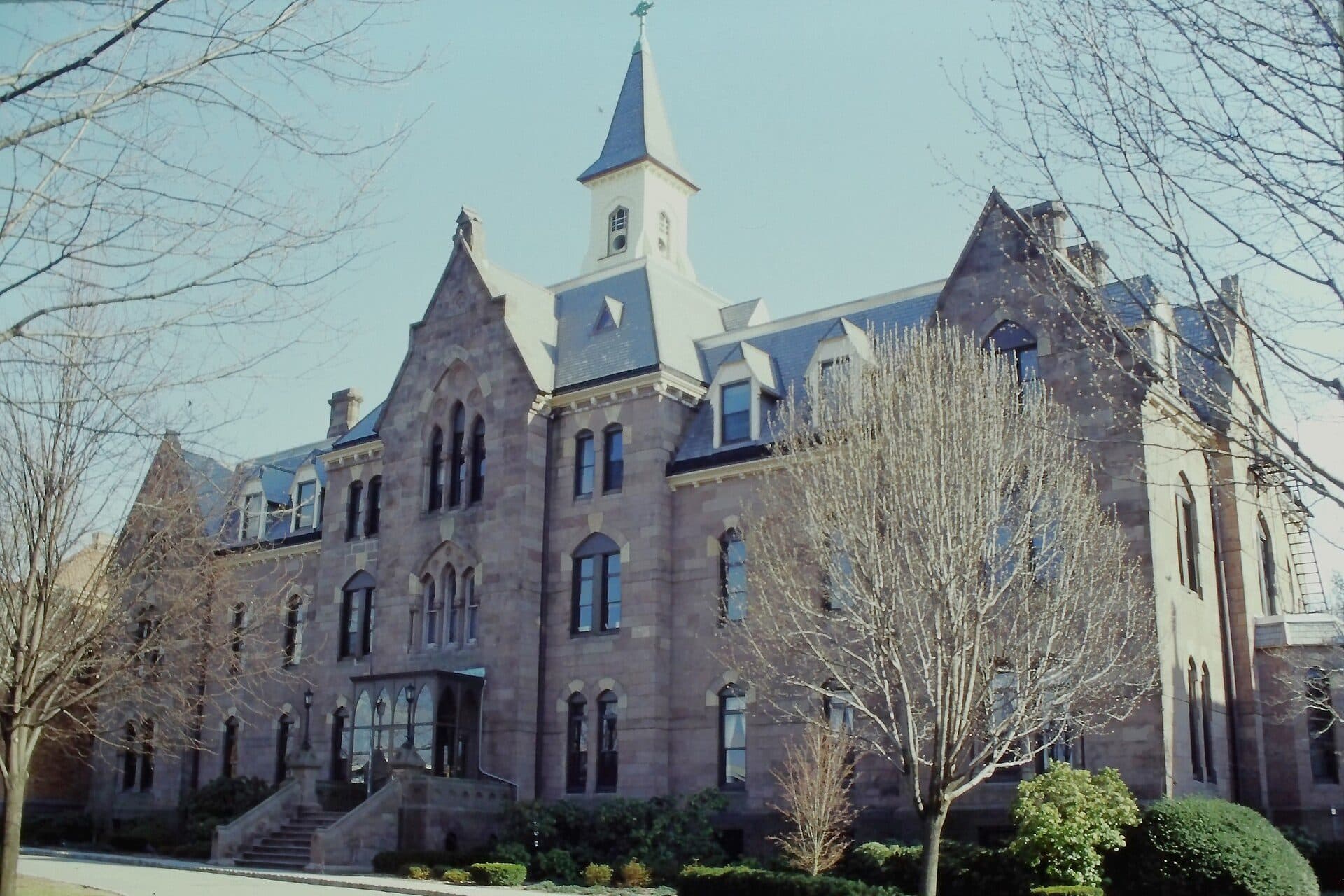 Presidents Hall, a Victorian Gothic stone building with a tall spire, on the Seton Hall campus in South Orange