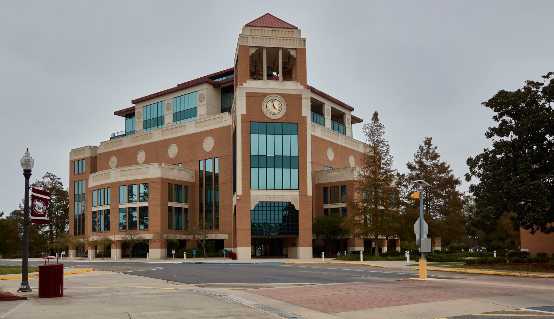 The University of Louisiana Monroe library, a brick-and-cream building topped by a clock tower